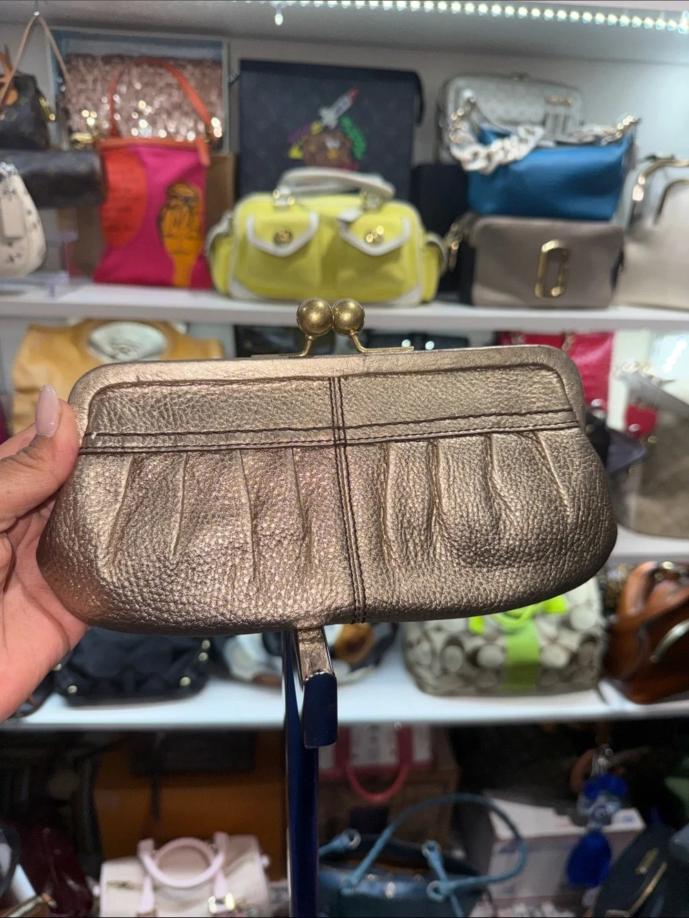Fossil wristlet metallic